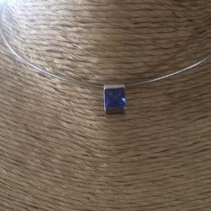 Silver tone necklace with bangle